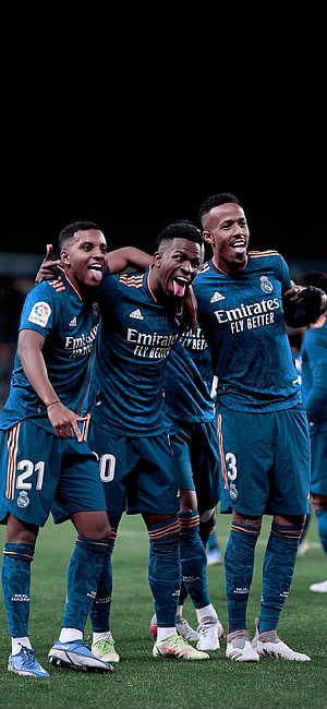 Real Madrid Players Rodrygo Vinicius Junior and Militao Celebrating on the Pitch HD phone wallpaper