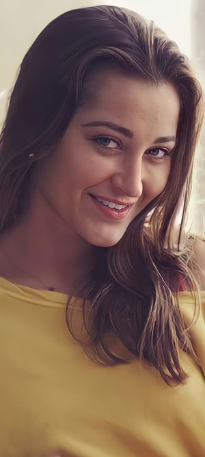 Portrait of a smiling woman with long brown hair wearing a yellow top, Daniels, head, nose HD phone wallpaper