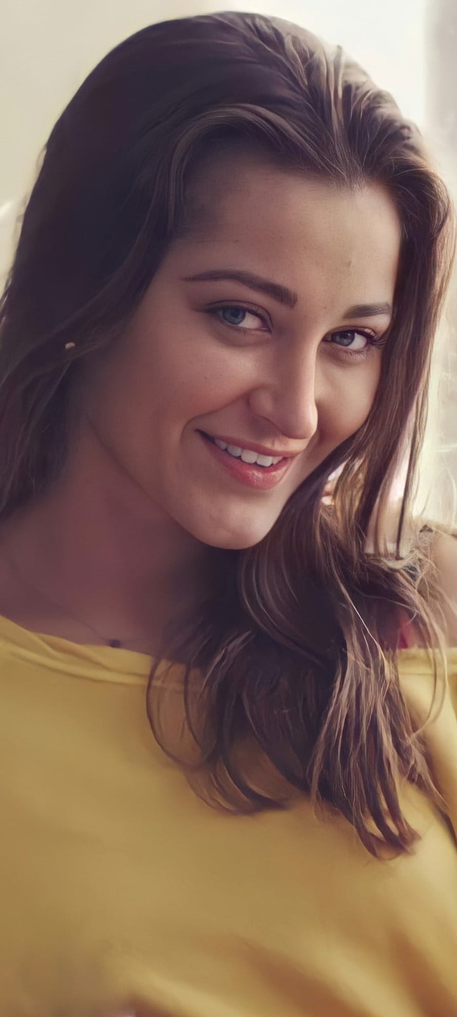 Portrait of a smiling woman with long brown hair wearing a yellow top, Daniels, head, nose HD phone wallpaper