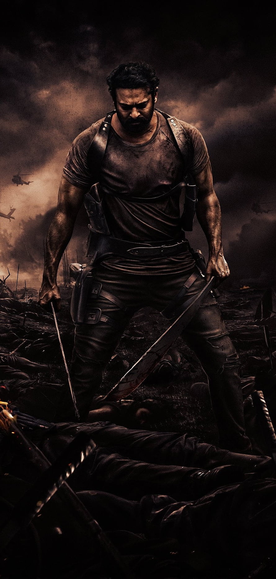 Intense warrior standing on a battlefield with dual swords amidst smoke and helicopters HD phone wallpaper