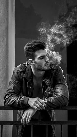 Handsome Man in Leather Jacket Smoking on Balcony Black and White Portrait, Attitude, Attitude Boy, Smoker Boy HD phone wallpaper