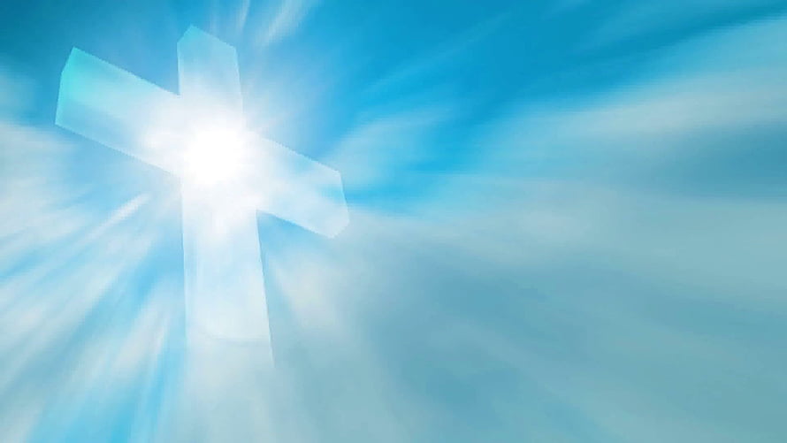 Glowing Christian Cross in Blue Sky with Divine Light Rays HD wallpaper