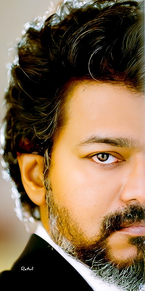 Thalapathy Vijay Close-Up Portrait With Intense Gaze And Styled Beard HD phone wallpaper