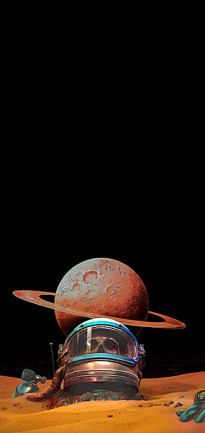 Astronaut Helmet Buried in Sand with Ringed Planet in Space HD phone wallpaper