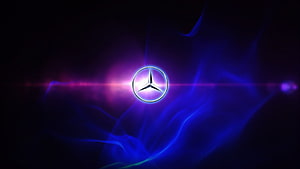 Glowing Mercedes-Benz Emblem Against Electric Blue and Purple Smoke HD wallpaper