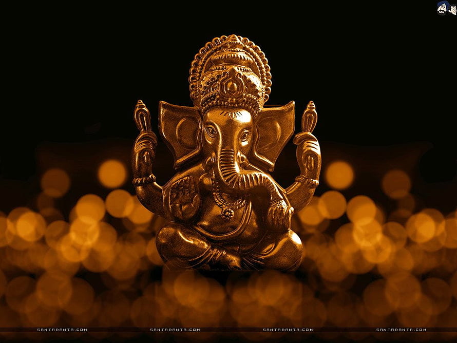 Golden Lord Ganesha Statue with Warm Bokeh Lights and Ornate Crown HD wallpaper