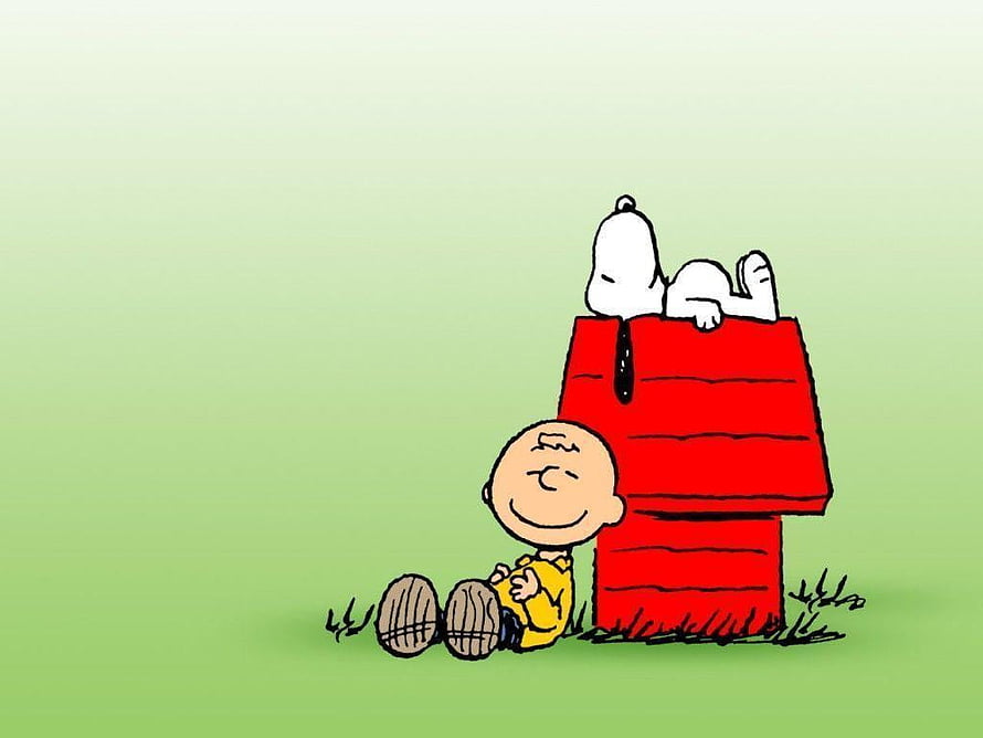 Snoopy and Charlie Brown relaxing by the red doghouse in a classic Peanuts scene HD wallpaper