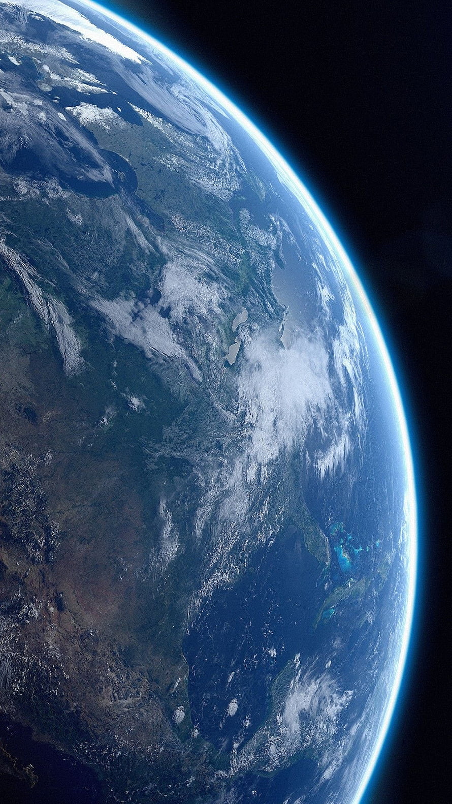 Planet Earth Viewed From Space With Glowing Atmosphere And Swirling Clouds HD phone wallpaper