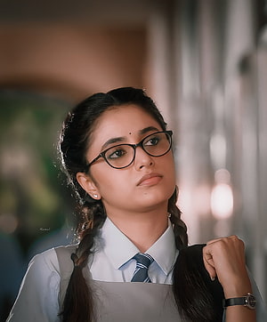 Priyanka Mohan in School Uniform with Glasses and Braided Hair HD phone wallpaper