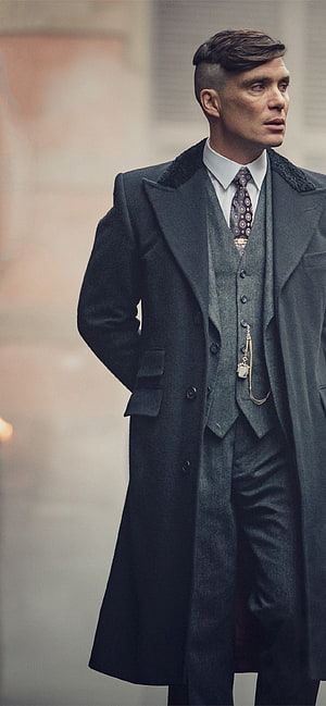 Thomas Shelby from Peaky Blinders in a grey overcoat and three-piece suit HD phone wallpaper