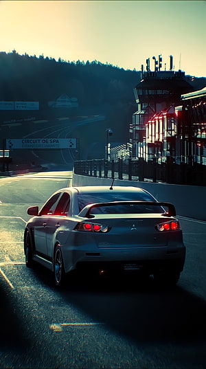 Mitsubishi Lancer Evolution at Spa-Francorchamps Circuit at Dusk HD phone wallpaper