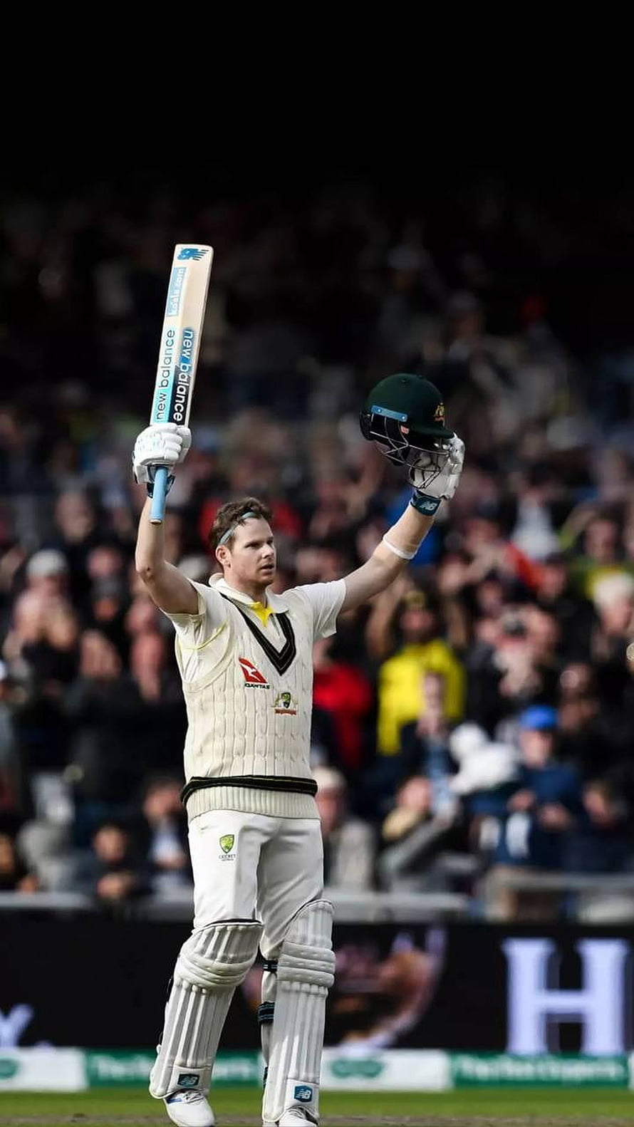 Steve Smith Celebrating a Milestone with Bat and Helmet Raised in Test Cricket HD phone wallpaper