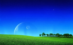 Surreal Fantasy Landscape With Green Rolling Hills, Distant Trees, And A Large Planet In A Deep Blue Night Sky HD wallpaper