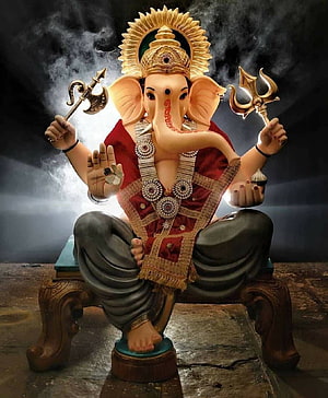 Ganesha Idol Holding Axe and Trishul with Red Vest and Golden Crown HD phone wallpaper