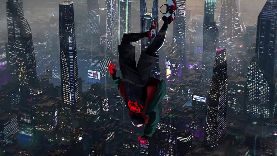 Miles Morales swinging upside down through a futuristic neon city skyline at night HD wallpaper