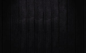 Dark Charcoal Wood Plank Texture with Subtle Grain and Vertical Paneling HD wallpaper