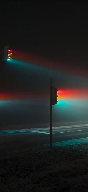 Glowing Traffic Lights in Foggy Night Atmosphere HD phone wallpaper