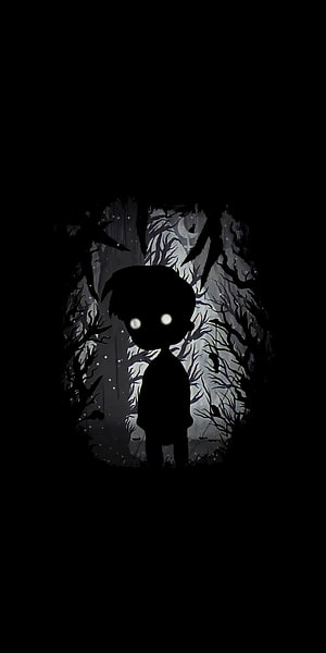 Silhouette of a small character with glowing eyes standing in a dark, spooky forest at night HD phone wallpaper