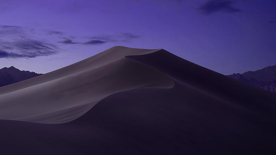 Purple Desert Dunes at Dusk with Distant Mountain Ranges Under a Twilight Sky HD wallpaper