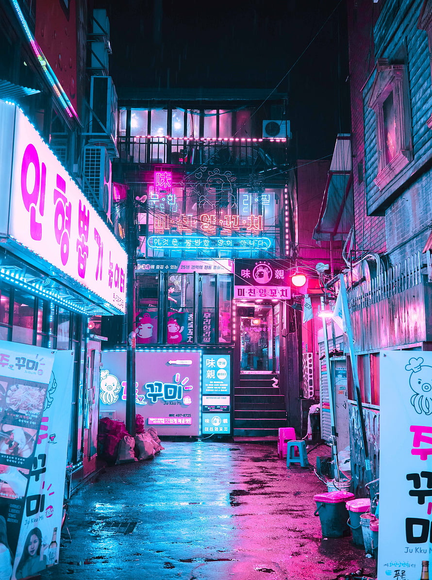 Neon-lit Seoul alleyway at night with vibrant pink and blue cyberpunk street photography HD phone wallpaper