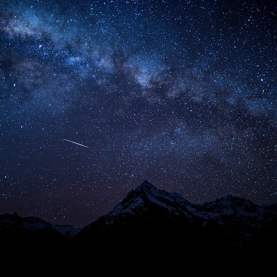 Milky Way Galaxy and Shooting Star Over Snow-Capped Mountain Peaks at Night HD phone wallpaper