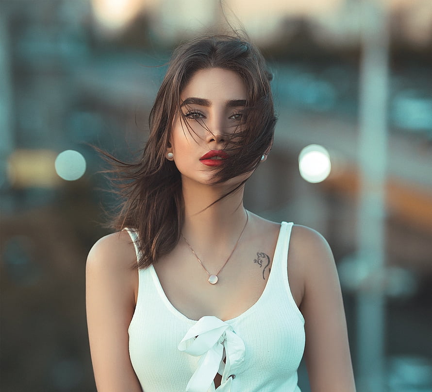 Portrait of a woman with windblown hair wearing a white top and red lipstick, Beautiful woman, brunette, white top HD wallpaper