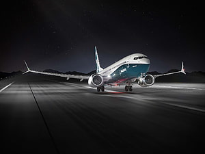 Boeing 737 MAX Commercial Jetliner Taking Off From Runway At Night HD wallpaper