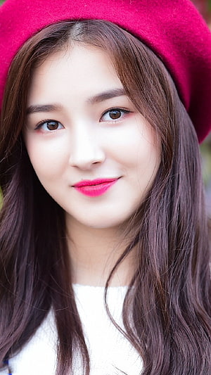 Nancy from Momoland wearing a red beret and white sweater portrait HD phone wallpaper
