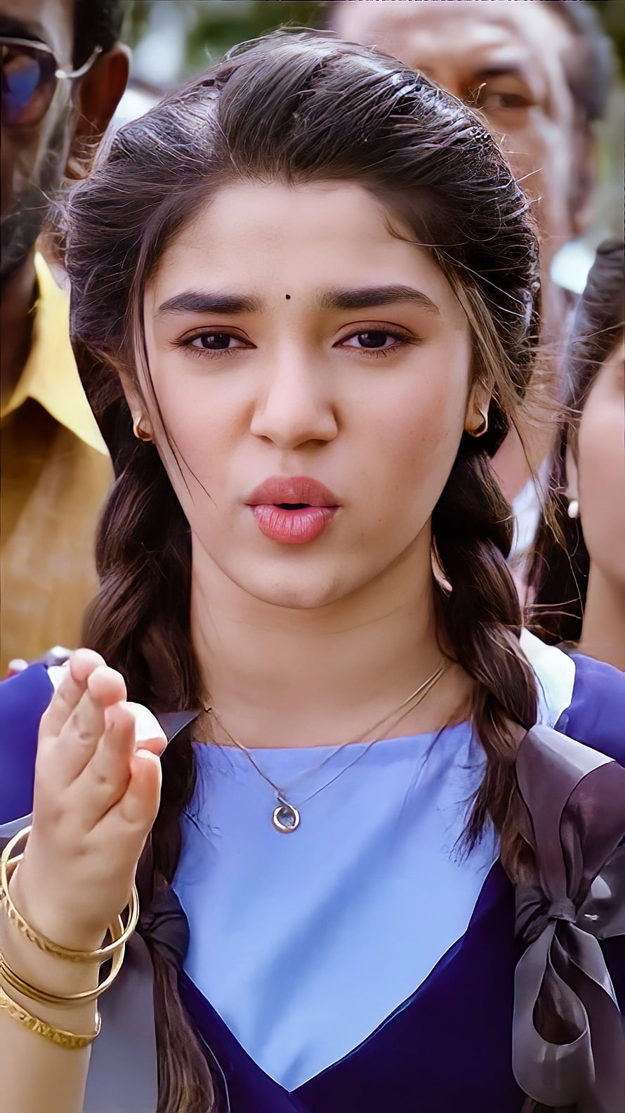 Kriti Shetty in a blue dress with braided hair and gold bangles HD phone wallpaper