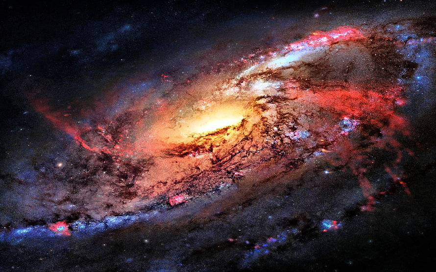 Vibrant Spiral Galaxy with Glowing Core and Dust Lanes in Deep Space HD wallpaper